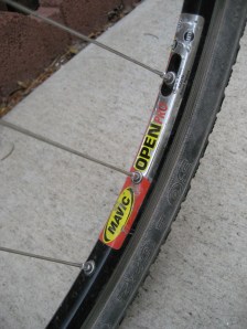 Now there's a Mavic wheel for ya: Open Pro rims, stainless-steel DT spokes and Dura-Ace Hubs. And the only thing cracked, broken or bent is the sumbitch ridin' it.