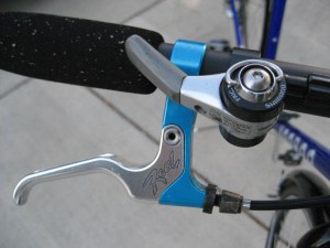 A Paul's Thumbie turns a bar-con into a thumb-shifter, and the Real levers need only an index finger to work.