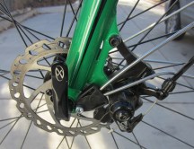 I had to put a little Irish on the front fender's left strut (it's much better than English) to work around the Hayes disc brake.