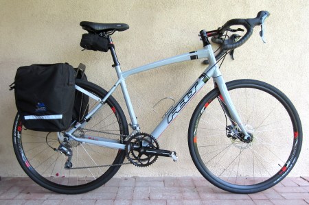 The Felt V100 is one of three bikes awaiting review for Adventure Cyclist. At $849, it's a cheap grocery-getter, even more so than a Honda Fit Sport.
