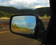 Diamonds on my windshield and rainbows in the rear view.