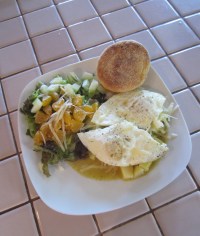Thanksgiving Day breakfast: leftover taters smothered in green with eggs over easy, English muffins and a side salad.
