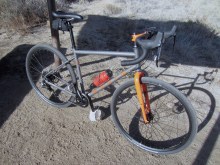 The Four Corners Elite isn't your grandpappy's steel touring bike, nosirree. Now get off my lawn. 