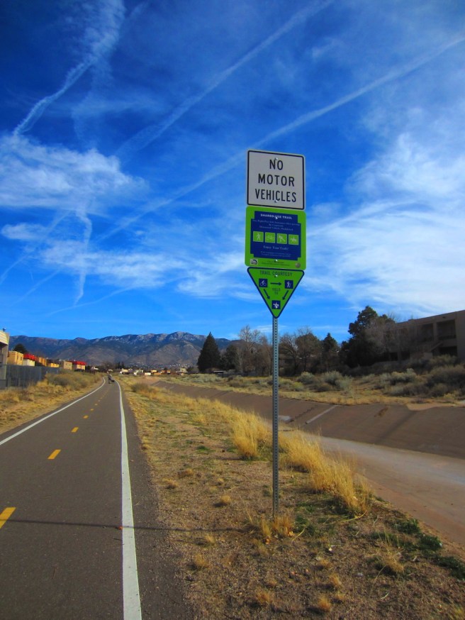 Headed east toward the Sandias and El Rancho Pendejo via the Bear Canyon Arroyo bike trail.